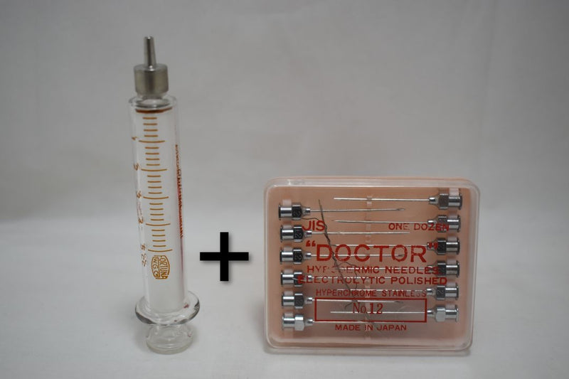 OPTIMA (Fortuna W.G.Co) GLASS HYPODERMIC SYRINGE (LUER-LOCK tip) with interchangeable components / Reusable / Γυάλινη Σύριγγα με μεταλλικό σύνδεσμο ασφαλείας, επαναχρησιμοποιήσιμη 5 c.c. +  STAINLESS STEEL NEEDLES / ΒΕΛΟΝΕΣ No 12 Μια Ντουζίνα (Δωδεκάδα).