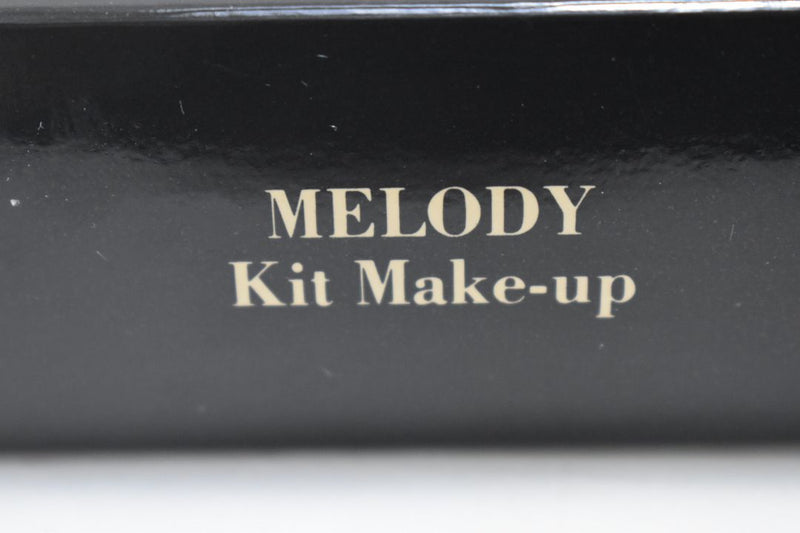 FASHION BAZAAR MELODY KIT MAKE-UP (1403-02) 32 EYE SHADOW + 3 BLUSH + 1 INDIAN EART + 1 TRANSPARENT COMPACT POWDER + 4 LIPS POWDER + 1 KAJAL BLACK PENCIL + 1 LIP PENCIL + PENCIL SHARPENER + 2 LIPSTICKS NET WT 31,18 g.