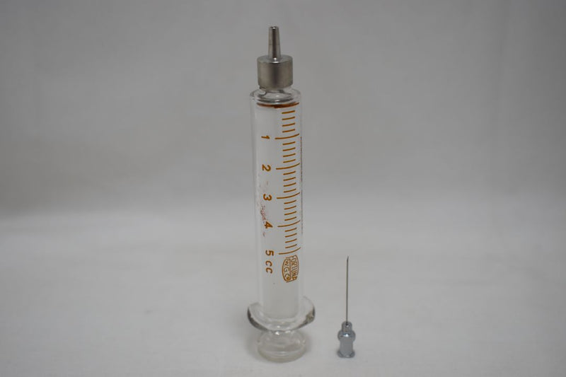 OPTIMA (Fortuna W.G.Co) GLASS HYPODERMIC SYRINGE (LUER-LOCK tip) with interchangeable components / Reusable / Γυάλινη Σύριγγα με μεταλλικό σύνδεσμο ασφαλείας, επαναχρησιμοποιήσιμη 5 c.c. + STAINLESS STEEL NEEDLES / ΒΕΛΟΝΑ No 18