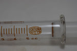 OPTIMA (Fortuna W.G.Co) GLASS HYPODERMIC SYRINGE (LUER-LOCK tip) with interchangeable components / Reusable / Γυάλινη Σύριγγα με μεταλλικό σύνδεσμο ασφαλείας, επαναχρησιμοποιήσιμη 5 c.c. +  STAINLESS STEEL NEEDLES / ΒΕΛΟΝΕΣ No 12 Μια Ντουζίνα (Δωδεκάδα).