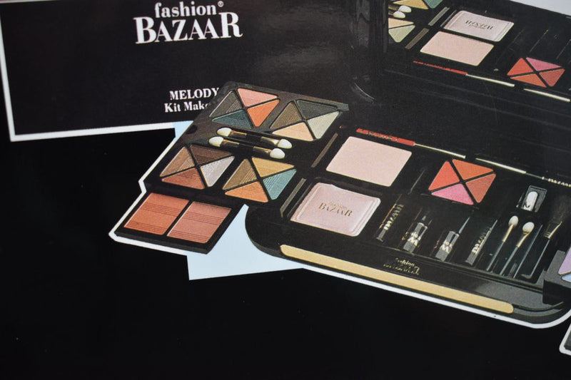 FASHION BAZAAR MELODY KIT MAKE-UP (1403-02) 32 EYE SHADOW + 3 BLUSH + 1 INDIAN EART + 1 TRANSPARENT COMPACT POWDER + 4 LIPS POWDER + 1 KAJAL BLACK PENCIL + 1 LIP PENCIL + PENCIL SHARPENER + 2 LIPSTICKS NET WT 31,18 g.