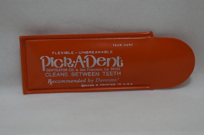 PICK-A-DENT (DENTICATOR CO. SAN FRANCISCO) REUSABLE PLASTIC TOOTHPICK DOUBLE ENDED / CLEANS BETWEEN TEETH IN INDIVIDUAL POUCHE WHITE COLOR / Επαναχρησιμοποιήσιμη πλαστική οδοντογλυφίδα διπλού άκρου, μέσα σε ατομική θήκη,  χρώματος λευκού.